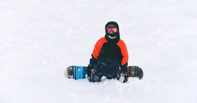 Winter Sport - Snowboarder on Snow Covered Ground