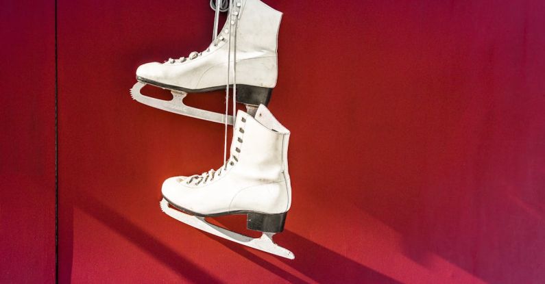 Ice Skating - Hanged Pair of White Leather Figure Skates