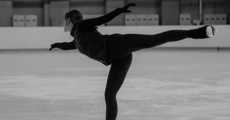 Ice Skating - Woman Doing Ice Skating in Grayscale Photography