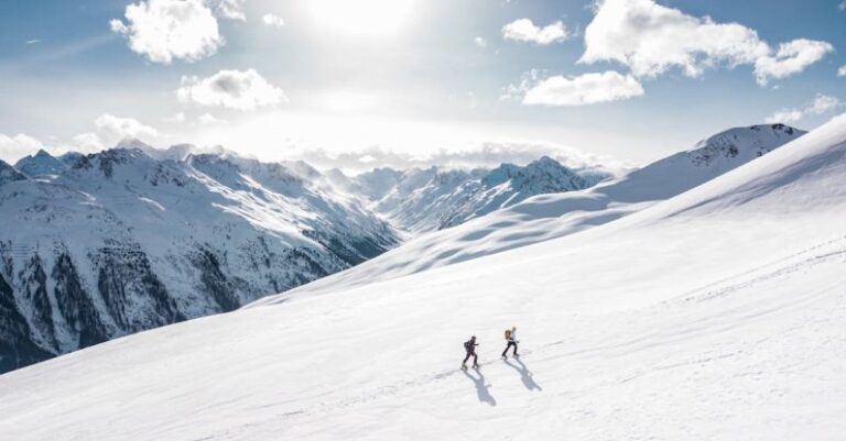 Ski - Two Man Hiking on Snow Mountain