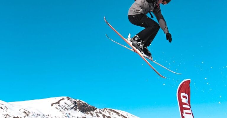 Snow Resort - Man Doing Snow Ski Blade Tricks on Air