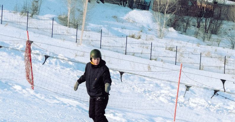Winter Sport - A person snowboarding down a snowy slope